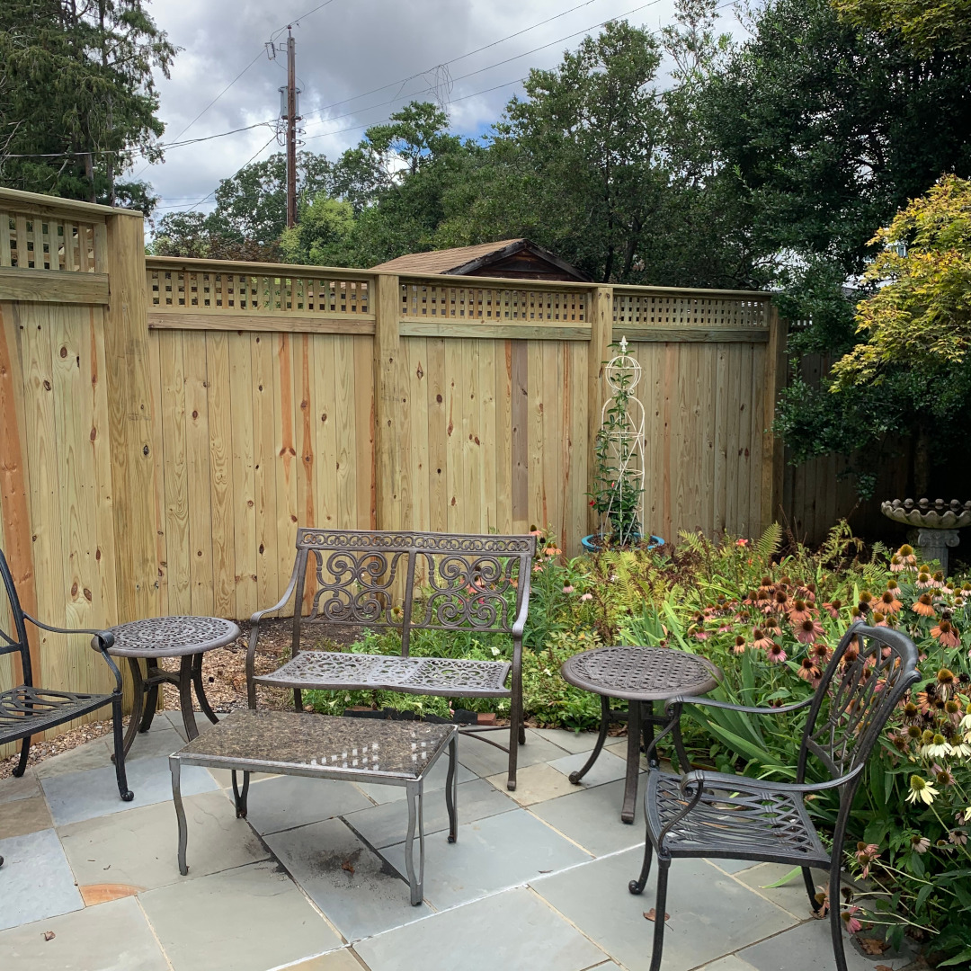 7' 7" tall wood privacy fence with horizontal lattice.