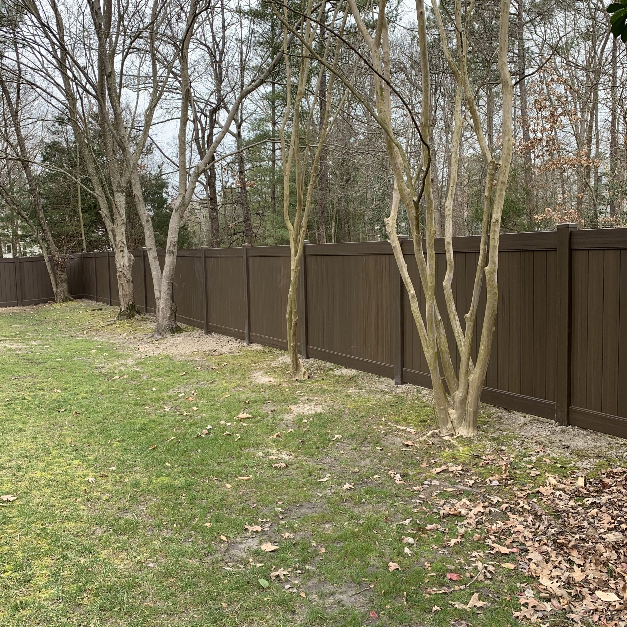 Chestnut brown vinyl privacy fence