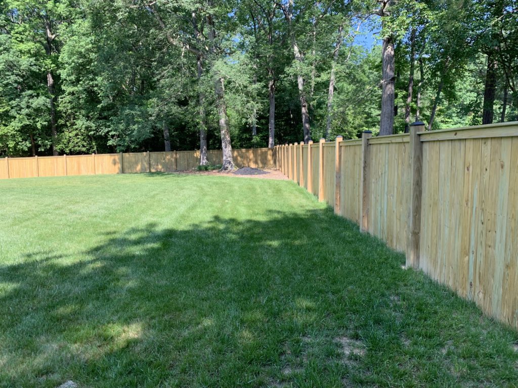 Top cap finish board wooden privacy fencing featuring all 6x6 posts
